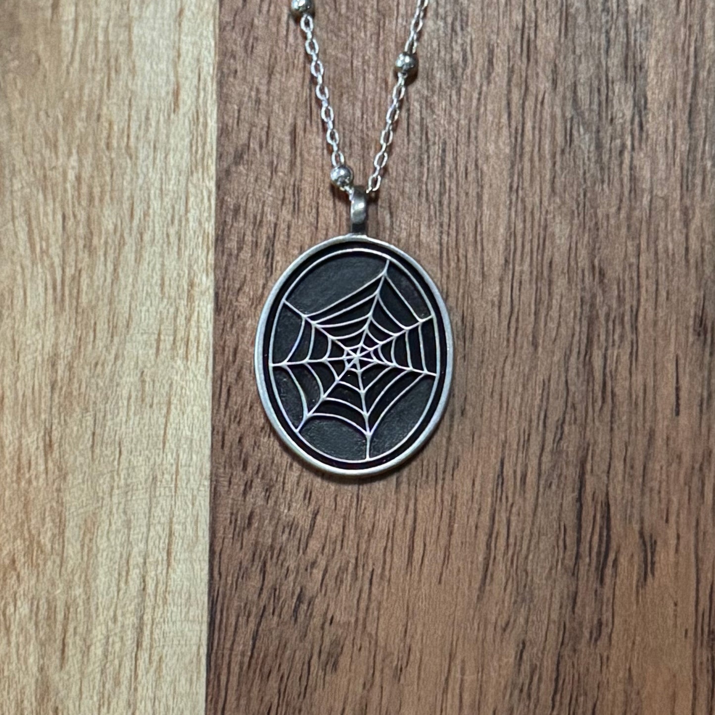 Oval Spiderweb Pendant